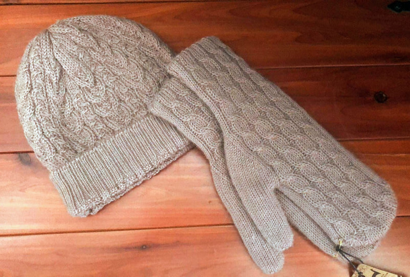 Beige alpaca mittens and a matching beige alpaca hat are for sale at Champlain Valley Alpacas.